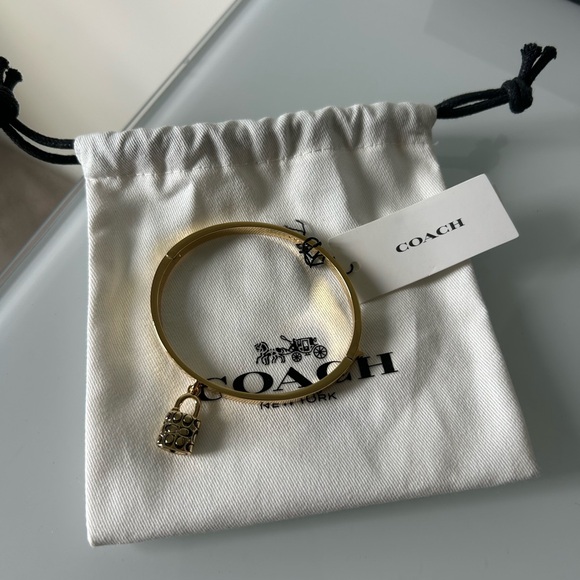 Coach Gold Lock with Black Enamel Charm Clasp Bracelet - Picture 2 of 6